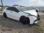 2021 Toyota Camry SE с VIN 4T1G11BK8MU026050, выставлен на аукционе Copart как лот 69176245 с пробегом 64 683 миль миль и Списание • Salvage title. История ставок и продаж доступна на DreamBid. Изображение 4.