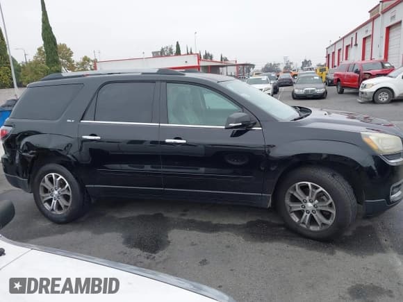 ✅ 2016 GMC Acadia SLT • VIN: 1GKKRRKD2GJ217206 • Lot: 43226180. Listed on IAAI with 118,543 mi. Free auction sales archive from the USA and detailed vehicle history report at DreamBid. Image 13.