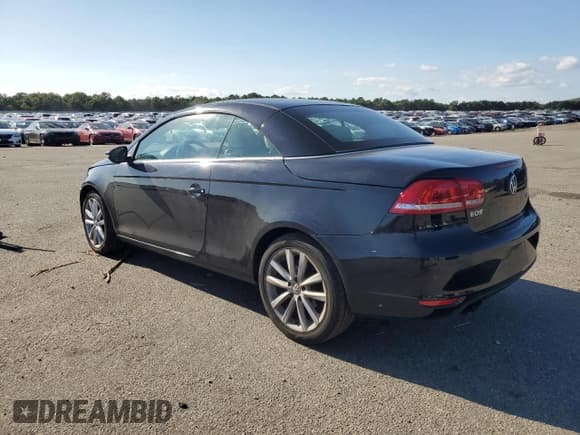 ✅ 2014 Volkswagen Eos Komfort • VIN: WVWBW8AH7EV000212 • Lot: 70678825. Wystawiony na Copart z przebiegiem 96 017 mil. Bezpłatny archiwum sprzedaży aukcyjnych z USA i szczegółowy raport historii pojazdu na DreamBid. Zdjęcie 2.