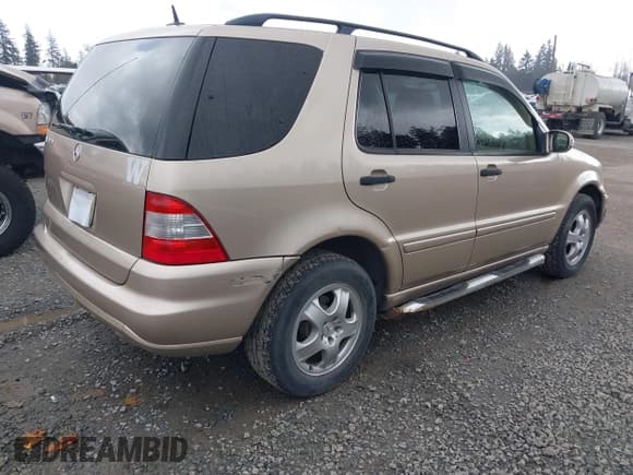 ✅ 2002 Mercedes-Benz M 320/430/500 • VIN: 4JGAB54E92A334912 • Lot: 41825224. Listed on IAAI with 172,579 mi. Free auction sales archive from the USA and detailed vehicle history report at DreamBid. Image 4.