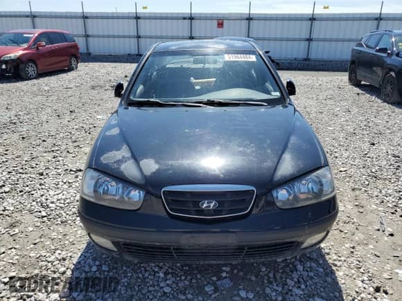 2003 Hyundai Elantra GLS z VIN KMHDN45D43U699230, wystawiony jako Copart lot #68822534 z przebiegiem 160 821 mil mil oraz Nie do naprawy • Non repairable. Historia ofert i sprzedaży dostępna na DreamBid. Obrazek 5.