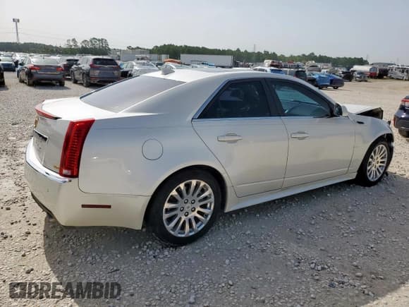 ✅ 2012 Cadillac CTS Premium • VIN: 1G6DP5E30C0125570 • Лот: 62860065. Опубликован ранее на Copart с пробегом 107 484 миль. Бесплатный доступ к архиву аукционных продаж из США и подробный отчёт об истории автомобиля на DreamBid. Изображение 3.