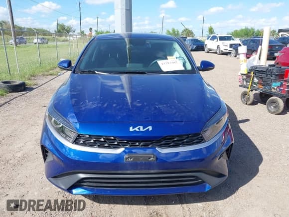 ✅ 2023 Kia Forte LXS • VIN: 3KPF24AD8PE683578 • Lot: 43293302. Listed on IAAI with 14,532 mi. Free auction sales archive from the USA and detailed vehicle history report at DreamBid. Image 12.