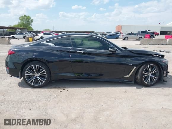 ✅ 2017 Infiniti Q60 Premium • VIN: JN1EV7EKXHM360247 • Lot: 43097065. Wystawiony na IAAI z przebiegiem 87 328 mil. Bezpłatny archiwum sprzedaży aukcyjnych z USA i szczegółowy raport historii pojazdu na DreamBid. Zdjęcie 14.