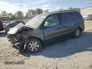 ✅ 2003 Honda Odyssey EX-L • VIN: 5FNRL18913B022716 • Lot: 70954695. Wystawiony na Copart z przebiegiem 197 285 mil. Bezpłatny archiwum sprzedaży aukcyjnych z USA i szczegółowy raport historii pojazdu na DreamBid. Zdjęcie 1.