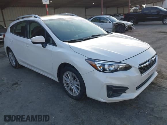 ✅ 2017 Subaru Impreza Premium • VIN: 4S3GTAD69H3719297 • Lot: 43799712. Listed on IAAI with 96,375 mi. Free auction sales archive from the USA and detailed vehicle history report at DreamBid. Image 1.