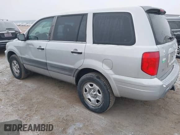 2004 Honda Pilot LX with VIN 2HKYF18144H541999, listed as a IAAI auction lot 40994494 with 265,086 mi miles and . Bid and sale history available at DreamBid. Image 3.