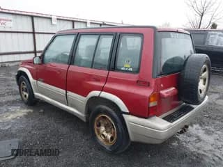 ✅ 1996 Suzuki Sidekick • VIN: JS3TD21V0T4107927 • Lot: 41249522. Listed on IAAI with 225,665 mi. Free auction sales archive from the USA and detailed vehicle history report at DreamBid. Image 3.