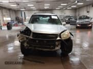 ✅ 2004 Toyota RAV4 • VIN: JTEHD20V246018528 • Lot: 43147354. Listed on IAAI with 205,590 mi. Free auction sales archive from the USA and detailed vehicle history report at DreamBid. Image 6.