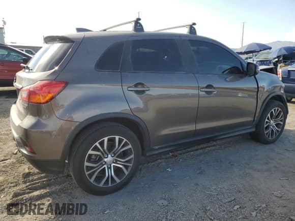 2019 Mitsubishi Outlander ES z VIN JA4AP3AU7KU027785, wystawiony jako Copart lot #71932825 z przebiegiem 63 159 mil mil oraz Szkoda całkowita • Salvage title. Historia ofert i sprzedaży dostępna na DreamBid. Obrazek 3.