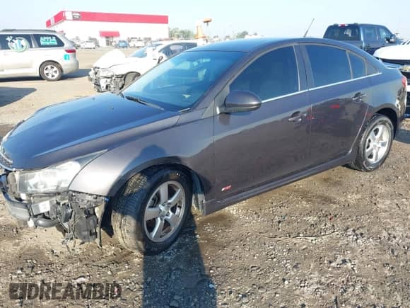 2014 Chevrolet Cruze 1LT with VIN 1G1PC5SB5E7173795, listed as a IAAI auction lot 43352603 with 100,794 mi miles and . Bid and sale history available at DreamBid. Image 2.