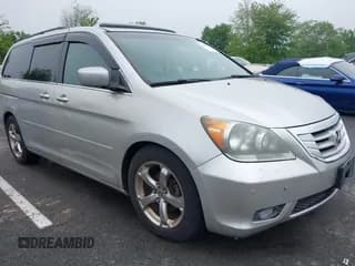 ✅ 2009 Honda Odyssey Touring • VIN: 5FNRL38859B029714 • Lot: 42266381. Listed on IAAI with 196,747 mi. Free auction sales archive from the USA and detailed vehicle history report at DreamBid. Image 1.