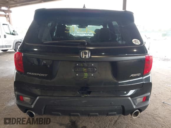 ✅ 2023 Honda Passport EX-L • VIN: 5FNYF8H52PB033173 • Lot: 42376245. Listed on IAAI with 24,134 mi. Free auction sales archive from the USA and detailed vehicle history report at DreamBid. Image 16.