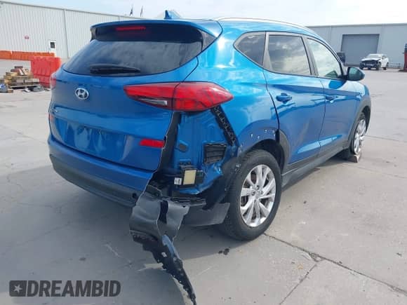 2019 Hyundai Tucson Value with VIN KM8J33A44KU957253, listed as a IAAI auction lot 42887799 with 57,676 mi miles and . Bid and sale history available at DreamBid. Image 6.