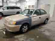 2005 Hyundai Accent GLS z VIN KMHCG45C85U579253, wystawiony jako Copart lot #44936145 z przebiegiem 197 561 mil mil oraz Czysty tytuł • Clean title. Historia ofert i sprzedaży dostępna na DreamBid. Obrazek 1.