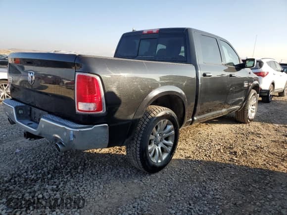 ✅ 2015 Ram 1500 Laramie Longhorn • VIN: 1C6RR6PM2FS755437 • Лот: 88933665. Опубликован ранее на Copart с пробегом 166 925 миль. Бесплатный доступ к архиву аукционных продаж из США и подробный отчёт об истории автомобиля на DreamBid. Изображение 3.