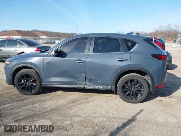 ✅ 2021 Mazda CX-5 Carbon Edition • VIN: JM3KFBCY4M0419731 • Лот: 41764840. Опубликован ранее на IAAI с пробегом 40 794 миль. Бесплатный доступ к архиву аукционных продаж из США и подробный отчёт об истории автомобиля на DreamBid. Изображение 14.