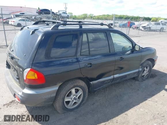 ✅ 2004 Hyundai Santa Fe GLS • VIN: KM8SC13D94U747420 • Лот: 42091747. Размещён на IAAI с пробегом 198 003 миль миль. Получите бесплатный доступ к архиву аукционных продаж из США и посмотрите подробный отчёт об истории автомобиля на DreamBid. Изображение 4.