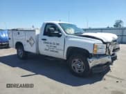 ✅ 2013 Chevrolet Silverado 2500HD Work Truck • VIN: 1GB0CVCG4DF133090 • Lot: 70621075. Wystawiony na Copart z przebiegiem 290 084 mil. Bezpłatny archiwum sprzedaży aukcyjnych z USA i szczegółowy raport historii pojazdu na DreamBid. Zdjęcie 4.