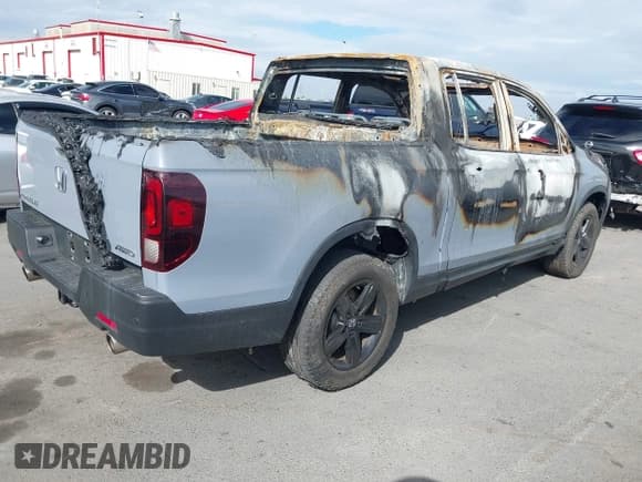 ✅ 2023 Honda Ridgeline Black Edition • VIN: 5FPYK3F88PB051812 • Lot: 43245405. Listed on IAAI with 11 mi. Free auction sales archive from the USA and detailed vehicle history report at DreamBid. Image 4.