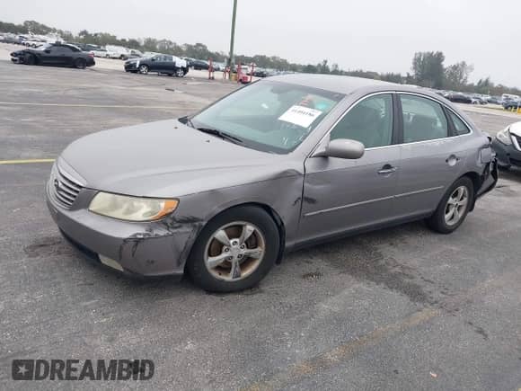 2007 Hyundai Azera SE z VIN KMHFC46FX7A188501, wystawiony jako IAAI lot #41404186 z przebiegiem 171 364 mil mil oraz . Historia ofert i sprzedaży dostępna na DreamBid. Obrazek 2.