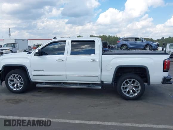 ✅ 2018 GMC Sierra 1500 SLT • VIN: 3GTU2NEC9JG542237 • Лот: 43311811. Опубликован ранее на IAAI с пробегом 99 681 миль. Бесплатный доступ к архиву аукционных продаж из США и подробный отчёт об истории автомобиля на DreamBid. Изображение 14.