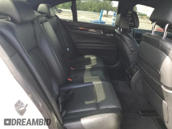 ✅ 2014 BMW 7 Series 750i • VIN: WBAYA8C53ED824903 • Lot: 56353665. Wystawiony na Copart z przebiegiem 82 240 mil. Bezpłatny archiwum sprzedaży aukcyjnych z USA i szczegółowy raport historii pojazdu na DreamBid. Zdjęcie 10.