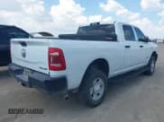 ✅ 2022 Ram 2500 Tradesman • VIN: 3C6UR5CJ3NG298322 • Lot: 43000975. Listed on IAAI with 97,692 mi. Free auction sales archive from the USA and detailed vehicle history report at DreamBid. Image 4.