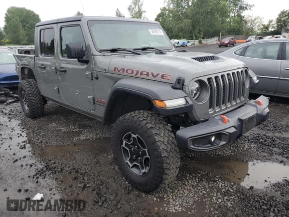 ✅ 2020 Jeep Gladiator Mojave • VIN: 1C6JJTEG9LL202452 • Lot: 56929215. Listed on Copart with 64,680 mi. Free auction sales archive from the USA and detailed vehicle history report at DreamBid. Image 4.