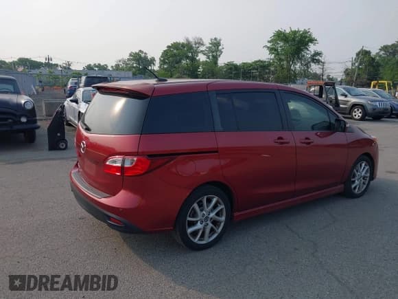 ✅ 2014 Mazda 5 Grand Touring • VIN: JM1CW2DL7E0166678 • Lot: 42438124. Listed on IAAI with 117,775 mi. Free auction sales archive from the USA and detailed vehicle history report at DreamBid. Image 4.