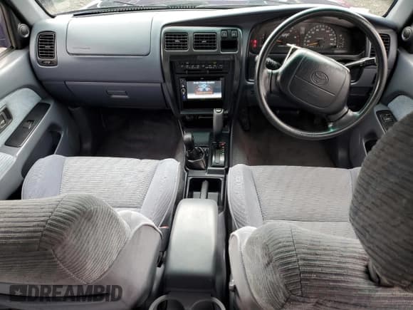 ✅ 1997 Toyota Hilux • VIN: KZN1859006586 • Lot: 92858915. Wystawiony na Copart z przebiegiem 266 802 mil. Bezpłatny archiwum sprzedaży aukcyjnych z USA i szczegółowy raport historii pojazdu na DreamBid. Zdjęcie 8.