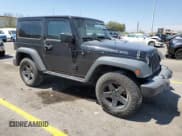 ✅ 2016 Jeep Wrangler Willys Wheeler • VIN: 1C4GJWAG7GL128044 • Lot: 67999665. Listed on Copart with 68,095 mi. Free auction sales archive from the USA and detailed vehicle history report at DreamBid. Image 4.