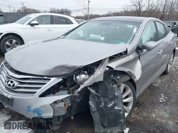 2014 Hyundai Azera Limited with VIN KMHFH4JG6EA361378, listed as a IAAI auction lot 41557210 with 58,561 mi miles and . Bid and sale history available at DreamBid. Image 6.