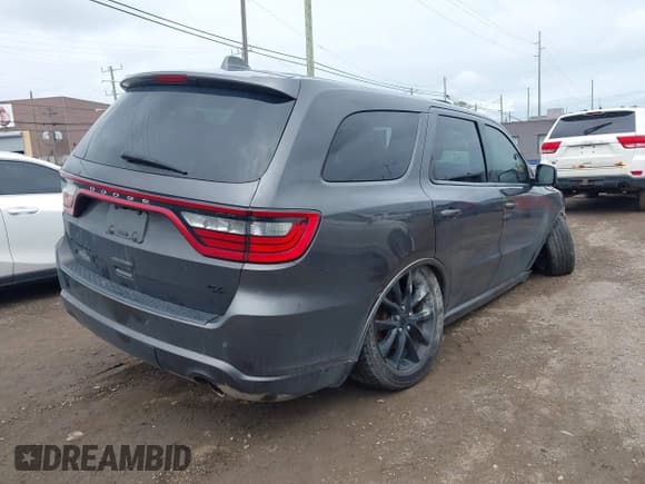 ✅ 2018 Dodge Durango R/T • VIN: 1C4SDJCT0JC372124 • Lot: 42259990. Listed on IAAI with 131,414 mi. Free auction sales archive from the USA and detailed vehicle history report at DreamBid. Image 4.