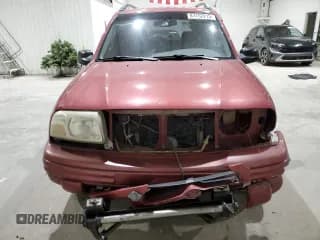 ✅ 1999 Suzuki Vitara JX • VIN: 2S3TD52V4X6110057 • Lot: 87752215. Wystawiony na Copart z przebiegiem 245 419 mil. Bezpłatny archiwum sprzedaży aukcyjnych z USA i szczegółowy raport historii pojazdu na DreamBid. Zdjęcie 5.