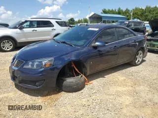 ✅ 2009 Pontiac G6 1SB • VIN: 1G2ZJ57K894256423 • Лот: 65524975. Опубликован ранее на Copart с пробегом 193 013 миль. Бесплатный доступ к архиву аукционных продаж из США и подробный отчёт об истории автомобиля на DreamBid. Изображение 1.