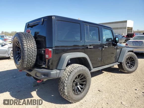 ✅ 2016 Jeep Wrangler Unlimited Rubicon • VIN: 1C4BJWFG0GL344398 • Lot: 87245225. Listed on Copart with 64,981 mi. Free auction sales archive from the USA and detailed vehicle history report at DreamBid. Image 3.