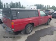 ✅ 1993 Nissan Frontier • VIN: 1N6SD11S6PC310288 • Lot: 43143437. Listed on IAAI with 228,866 mi. Free auction sales archive from the USA and detailed vehicle history report at DreamBid. Image 4.