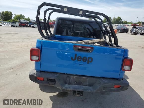 ✅ 2023 Jeep Gladiator Sport S • VIN: 1C6HJTAG5PL575997 • Lot: 70663745. Listed on Copart with 43,333 mi. Free auction sales archive from the USA and detailed vehicle history report at DreamBid. Image 6.