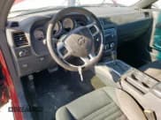 ✅ 2012 Dodge Challenger SXT • VIN: 2C3CDYAG9CH291291 • Lot: 48974425. Wystawiony na Copart z przebiegiem 139 441 mil. Bezpłatny archiwum sprzedaży aukcyjnych z USA i szczegółowy raport historii pojazdu na DreamBid. Zdjęcie 8.