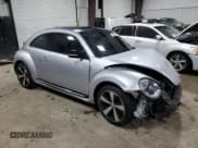 ✅ 2012 Volkswagen Beetle Turbo • VIN: 3VWVA7AT8CM628164 • Lot: 85227914. Wystawiony na Copart z przebiegiem 89 403 mil. Bezpłatny archiwum sprzedaży aukcyjnych z USA i szczegółowy raport historii pojazdu na DreamBid. Zdjęcie 4.