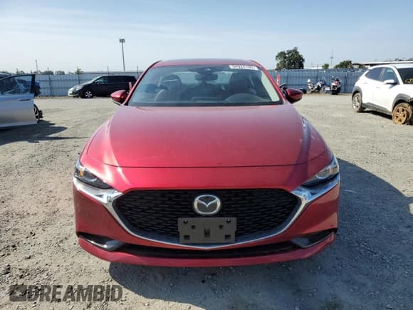 ✅ 2022 Mazda 3 Carbon Edition • VIN: JM1BPACL2N1506916 • Лот: 54924185. Опубликован ранее на Copart с пробегом 71 622 миль. Бесплатный доступ к архиву аукционных продаж из США и подробный отчёт об истории автомобиля на DreamBid. Изображение 5.