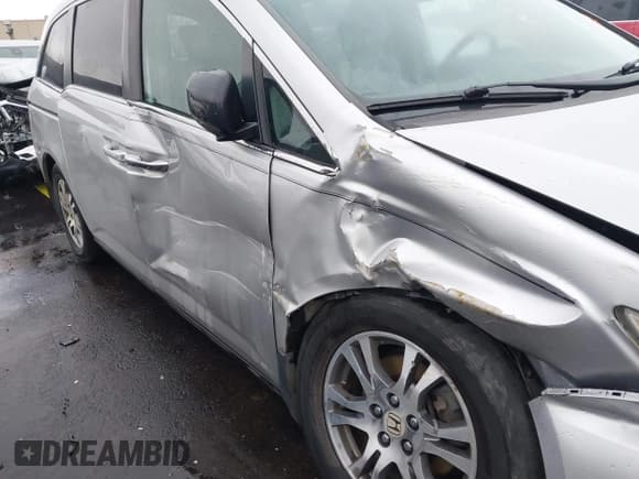 ✅ 2012 Honda Odyssey EX-L • VIN: 5FNRL5H61CB030022 • Lot: 43730404. Listed on IAAI with 153,349 mi. Free auction sales archive from the USA and detailed vehicle history report at DreamBid. Image 6.