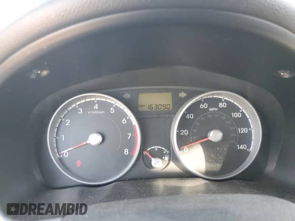 2010 Hyundai Accent GLS z VIN KMHCN4AC5AU458671, wystawiony jako Copart lot #78233554 z przebiegiem 163 090 mil mil oraz Szkoda całkowita • Salvage title. Historia ofert i sprzedaży dostępna na DreamBid. Obrazek 9.