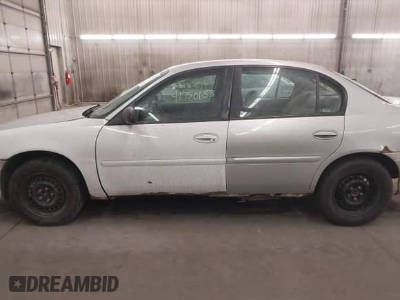 2003 Chevrolet Malibu z VIN 1G1ND52J73M536270, wystawiony jako IAAI lot #41750653 z przebiegiem 128 005 mil mil oraz . Historia ofert i sprzedaży dostępna na DreamBid. Obrazek 14.