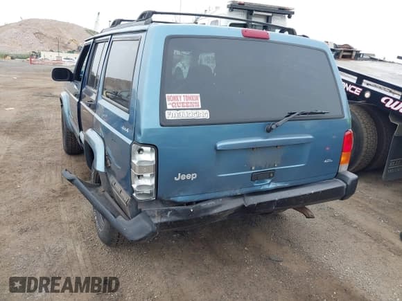 ✅ 1999 Jeep Cherokee Sport • VIN: 1J4FF68S7XL513640 • Lot: 42913382. Listed on IAAI with 207,133 mi. Free auction sales archive from the USA and detailed vehicle history report at DreamBid. Image 6.