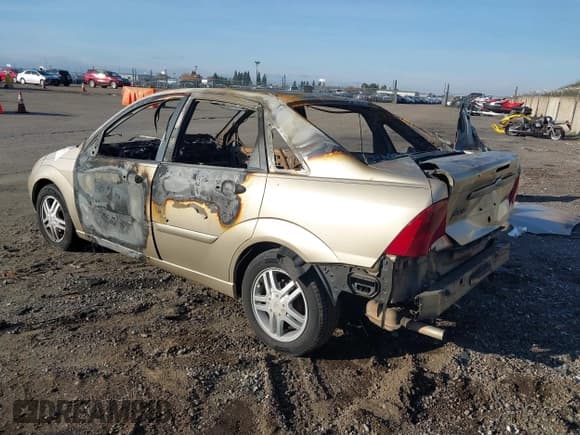 ✅ 2002 Ford Focus SE • VIN: 1FAFP34P22W279908 • Lot: 43794473. Listed on IAAI with Not provided. Free auction sales archive from the USA and detailed vehicle history report at DreamBid. Image 3.