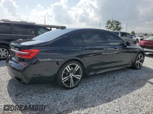 ✅ 2018 BMW 7 Series 750i • VIN: WBA7F0C58JGM22981 • Лот: 58816625. Опубликован ранее на Copart с пробегом 6 213 миль. Бесплатный доступ к архиву аукционных продаж из США и подробный отчёт об истории автомобиля на DreamBid. Изображение 3.