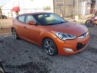 2012 Hyundai Veloster w/Black Int with VIN KMHTC6AD5CU044657, listed as a IAAI auction lot 41896892 with 115,846 mi miles and . Bid and sale history available at DreamBid. Image 1.