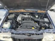 ✅ 2002 Kia Sportage • VIN: KNDJB723725162910 • Lot: 63429425. Wystawiony na Copart z przebiegiem 217 051 mil. Bezpłatny archiwum sprzedaży aukcyjnych z USA i szczegółowy raport historii pojazdu na DreamBid. Zdjęcie 11.